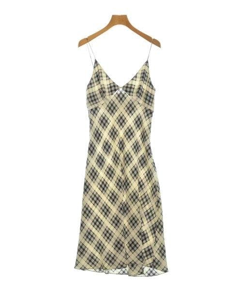 MARC JACOBS women's yellow plaid slip dress with thin straps hanging on a wooden hanger.