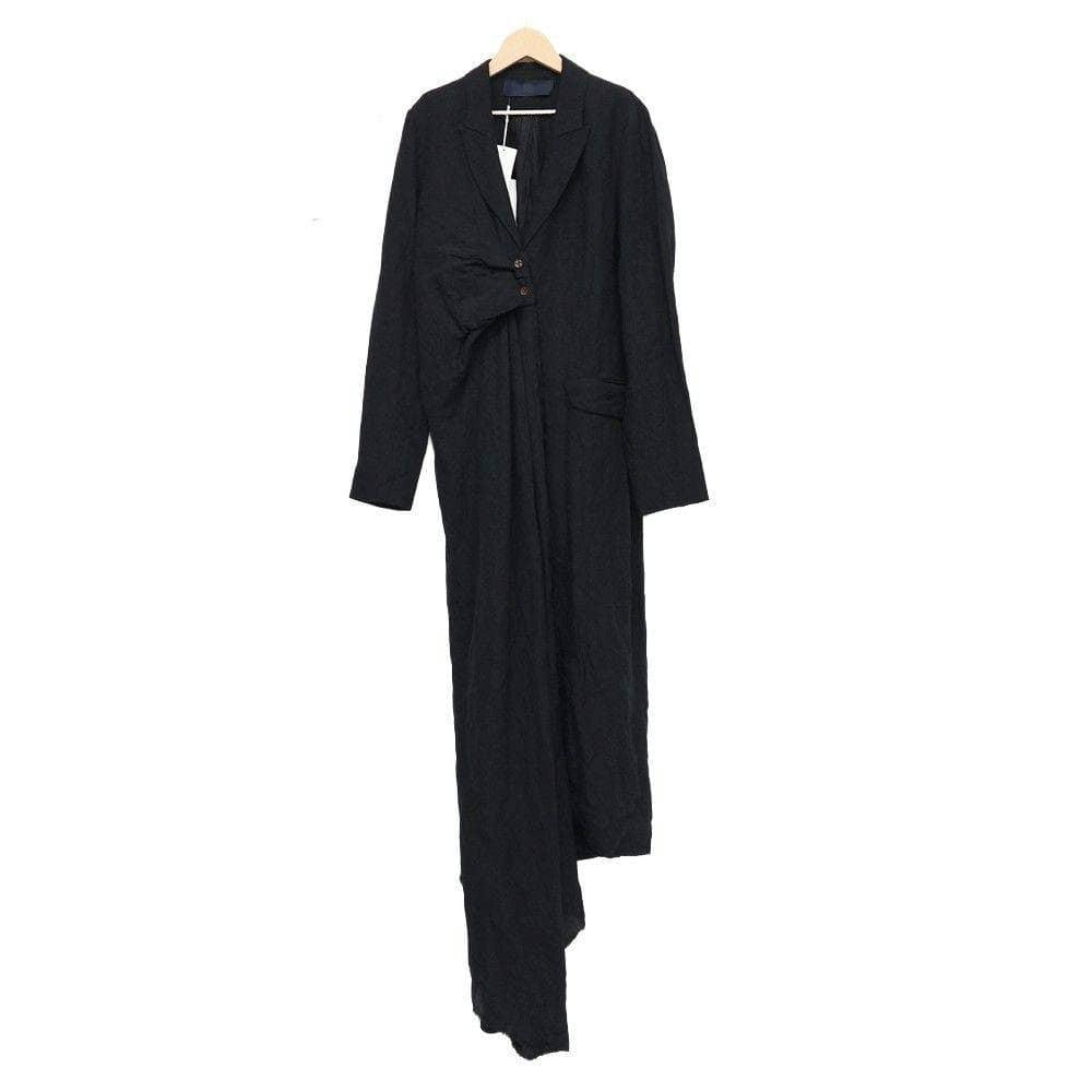 Front view of a men's black linen coat by MARC LE BIHAN hanging on a wooden hanger with tags visible.