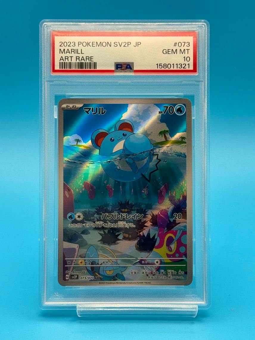 Front of the Marill AR trading card (SV2P 073/071) shown inside a clear PSA grading slab with the label visible.