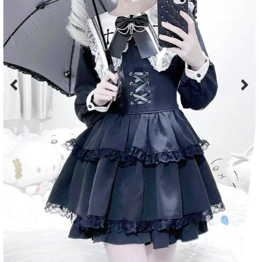 Front view of the black MARS three-tier frilled long-sleeve set with lace trim shown on a model holding a parasol.