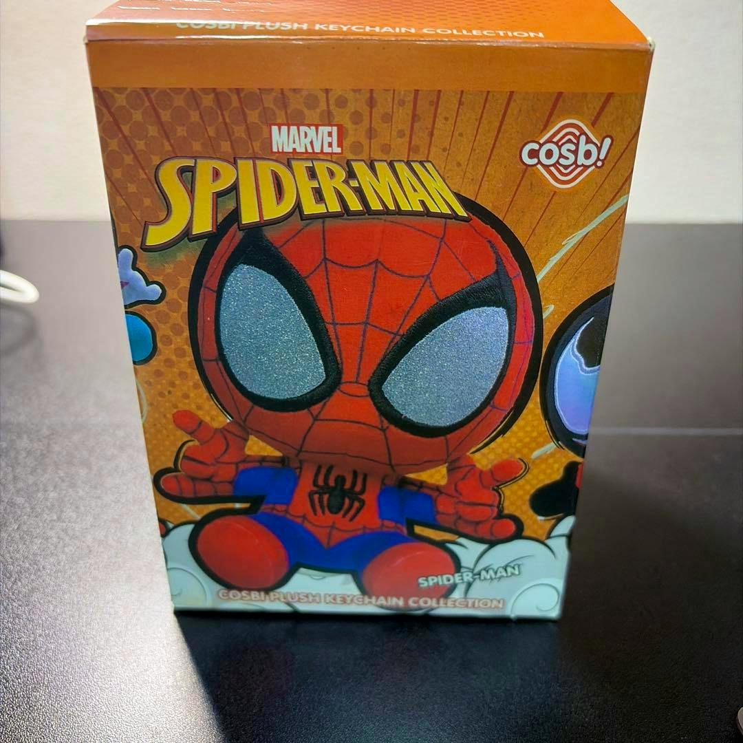 Front of the Marvel Spider-Man plush keychain box showing cartoon Spider-Man artwork and branding.