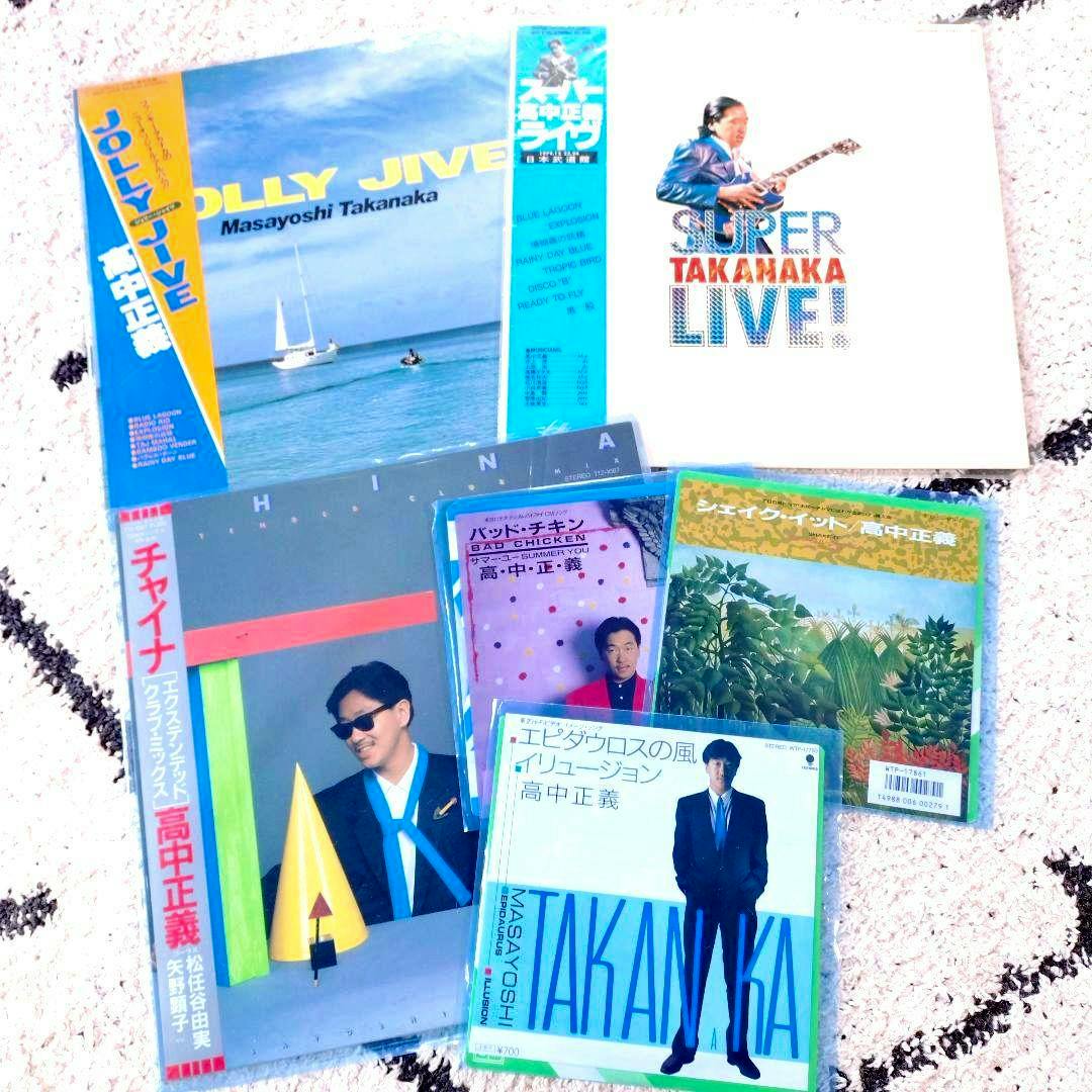 A set of Masayoshi Takanaka LP and single record covers laid out together, showing album artwork and obi strips.