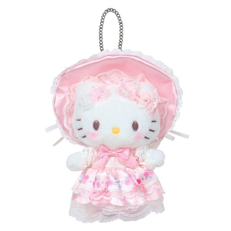 White plush mascot bag charm wearing a pink frilly bonnet and dress with an attached metal ball chain.