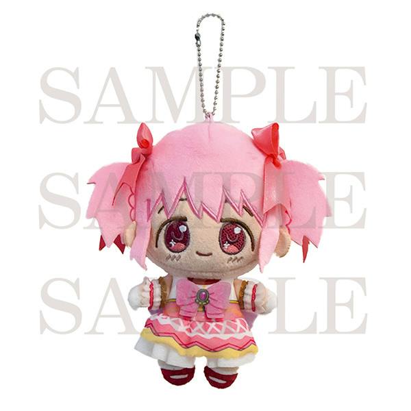 Pink-haired mascot plush keychain wearing a pink dress with bows.