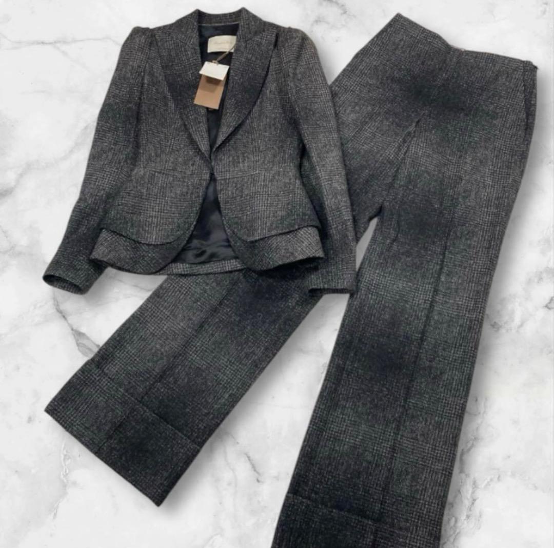 Massimo Dutti gray checked pantsuit (jacket and matching trousers) laid flat with tags attached.