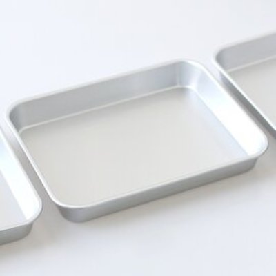 Rectangular stainless steel tray shown on a plain white background.
