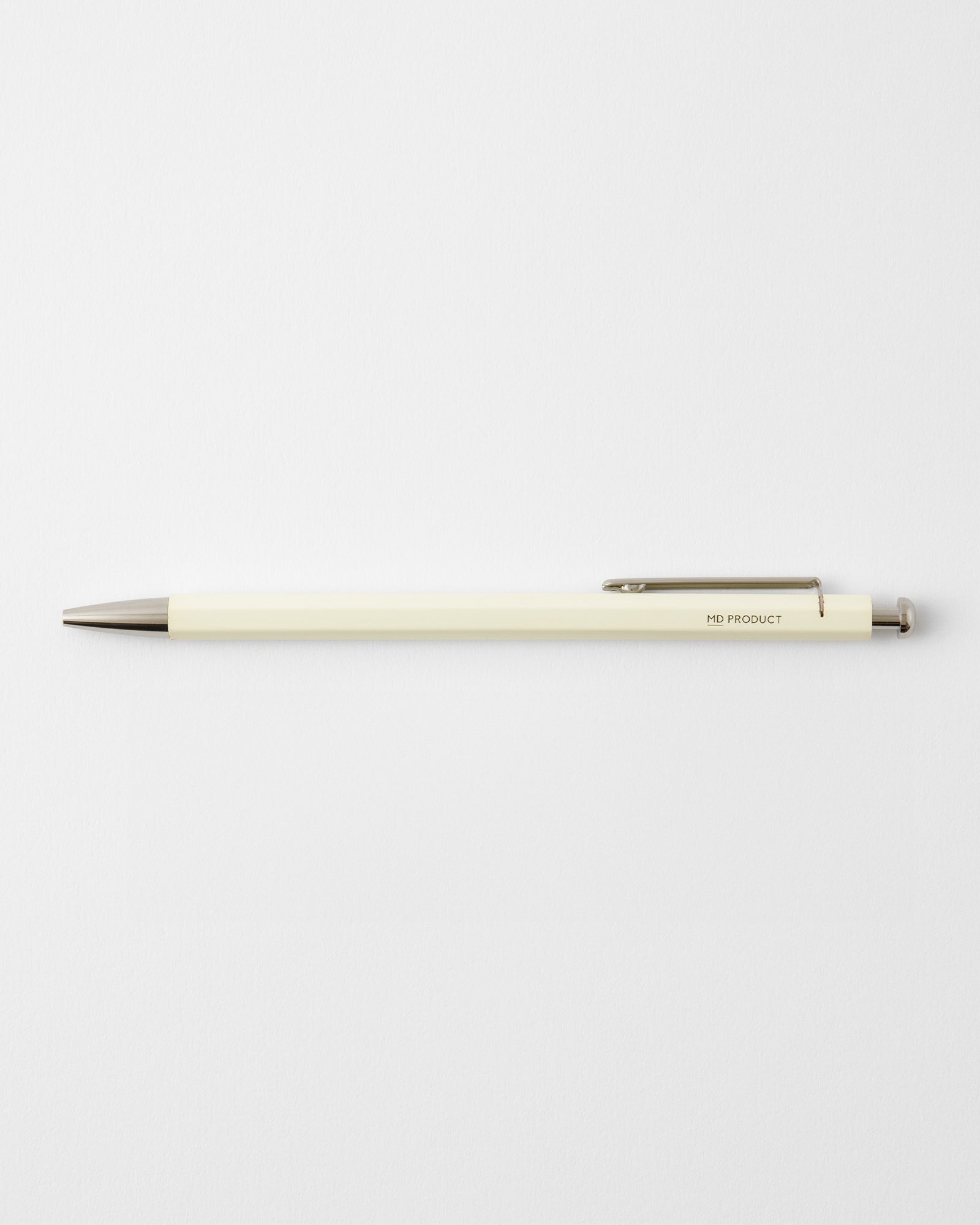 MD Knock Pencil B mechanical pencil lying on a white background.