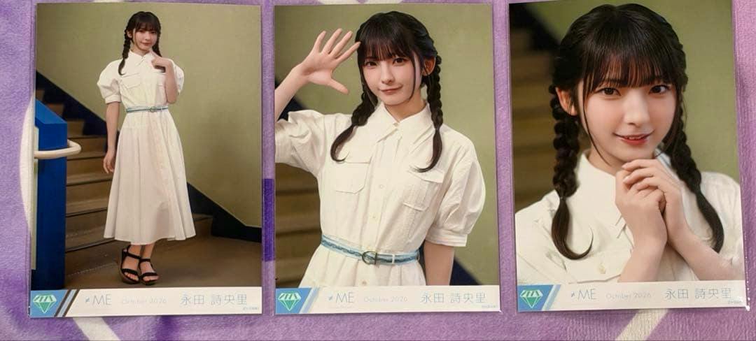 Three photocard prints of 永田詩央里 (Nagata Shiori) from the Summer haze set, showing her in a white dress laid side by side on a purple background.