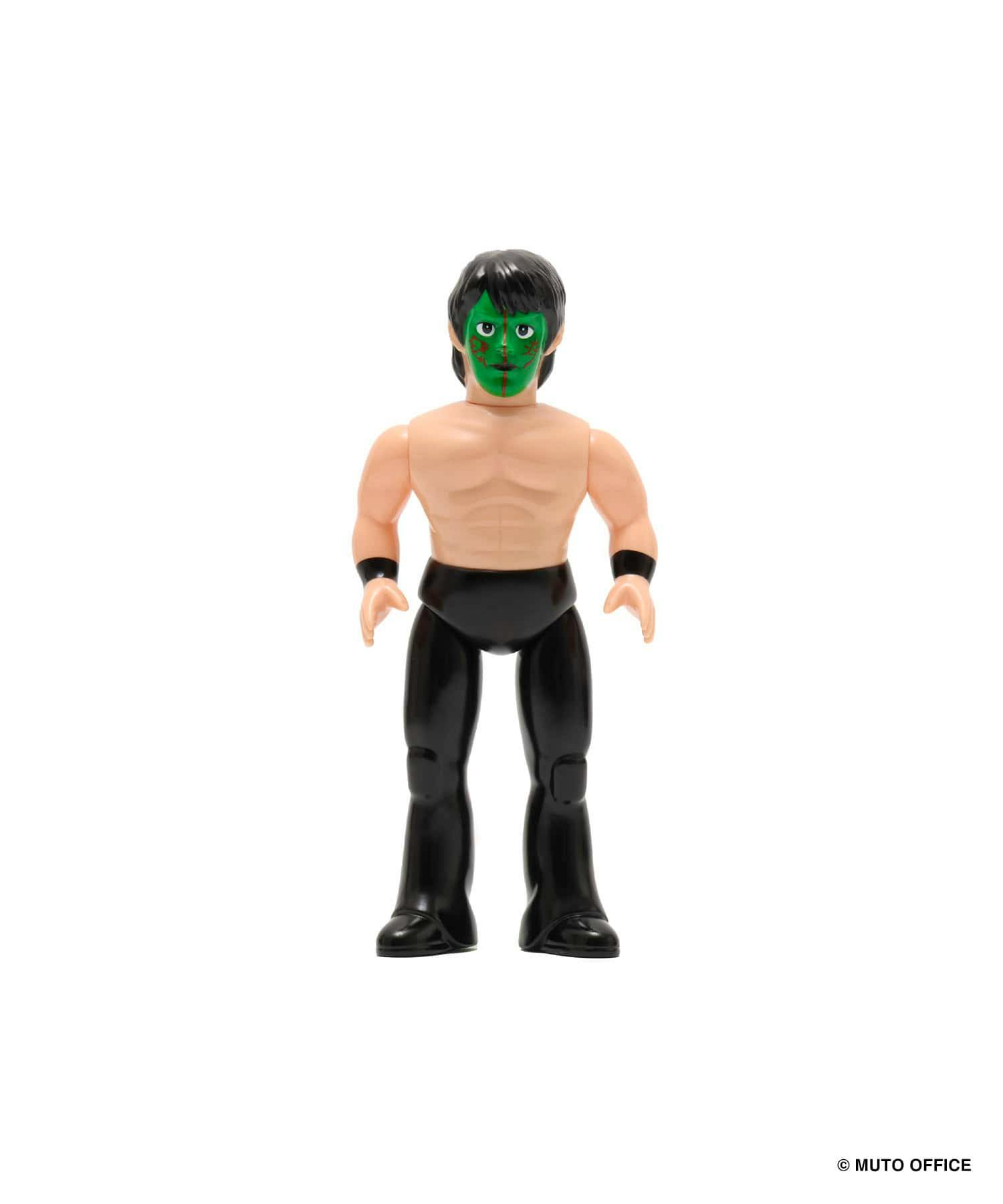 Front view of the MEDICOM TOY SFS Great Muta (green version) plastic figure standing against a white background.