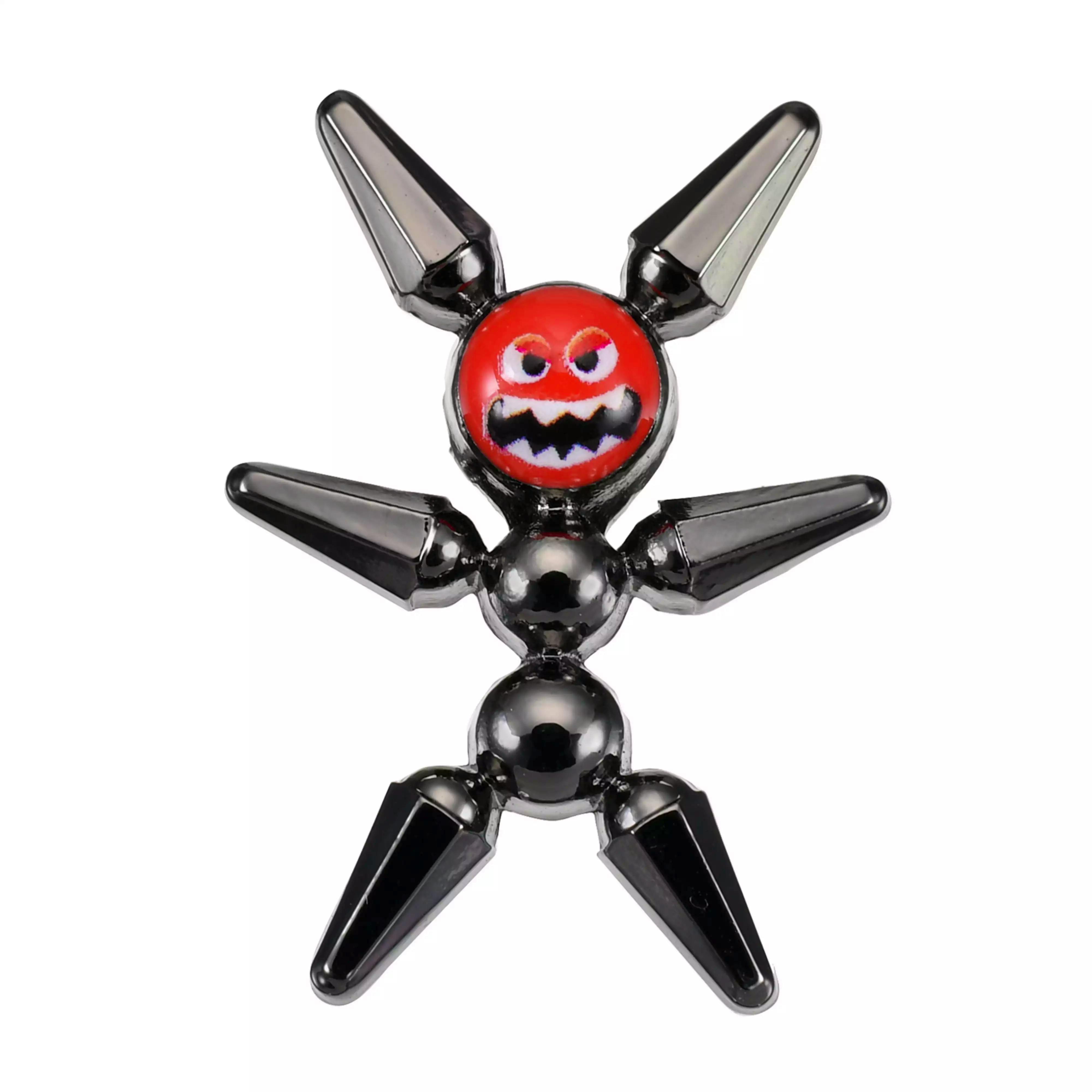 Close-up front view of the metal pin badge showing a red angry face charm and a black metallic body.