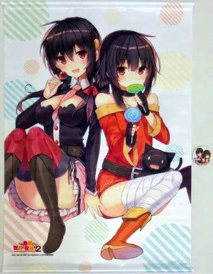 Photo of the B2 tapestry showing Megumin and Yunyun from the series, with the included round can badge visible.