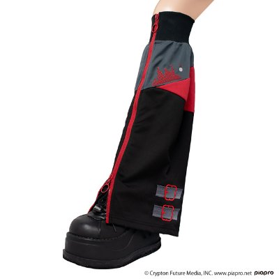 Black and red leg cover shown on a model's lower leg paired with a platform shoe.