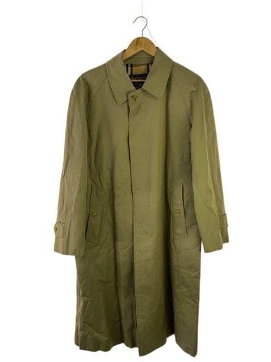 Beige cotton men's trench coat hanging on a hanger, front view showing the coat's full length.
