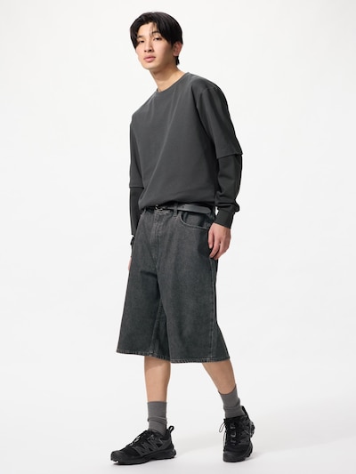 Male model wearing the men's dark knee-length shorts (cotton) shown full-length against a white background.