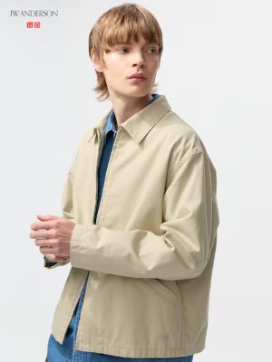 Male model wearing a beige men's zip-up cotton jacket with a collar.