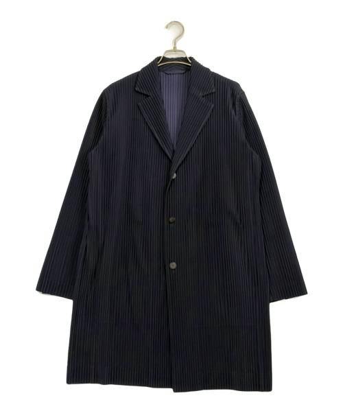 Front view of a men's pleated coat hanging on a hanger against a white background.