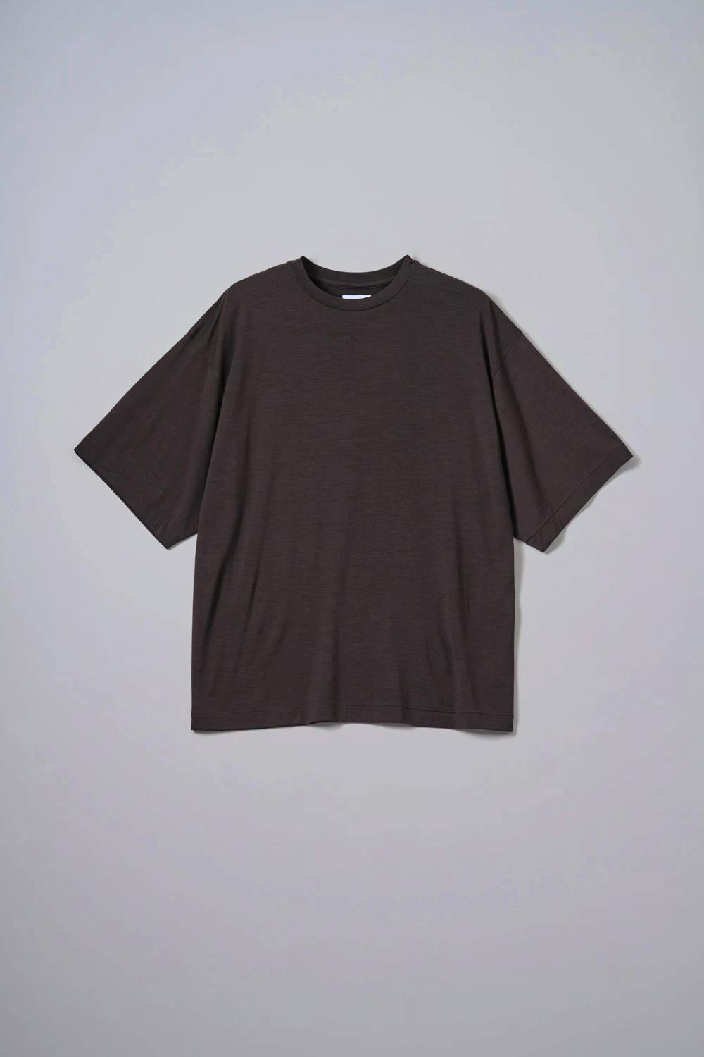 Dark brown Wool Merino half-sleeve tee laid flat on a light gray background.