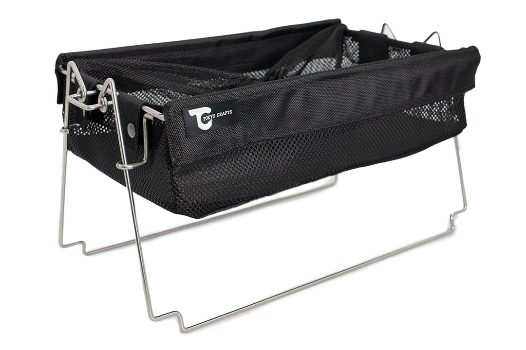 Black mesh bucket shelf with a metal wire frame shown on a white background.