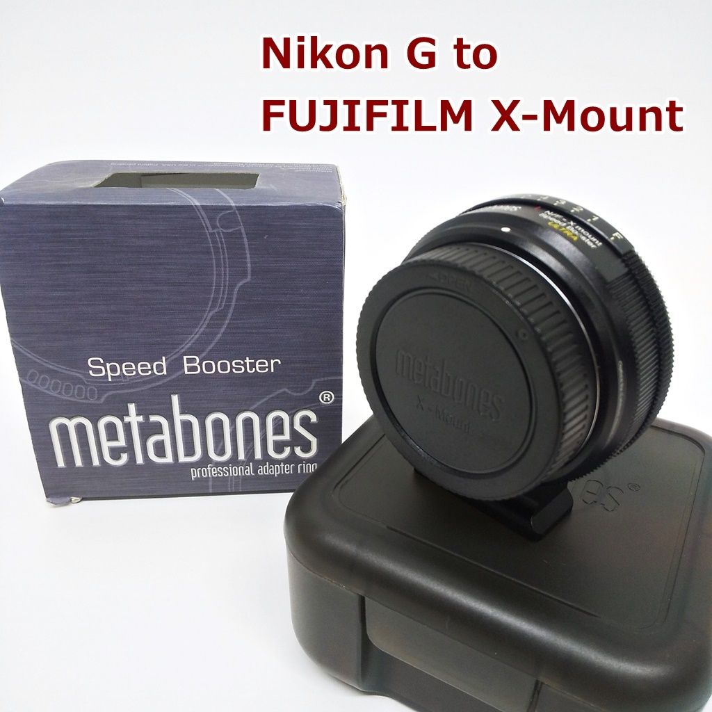 Metabones Nikon G to FUJIFILM X-Mount Speed Booster adapter shown with its box and carrying case.