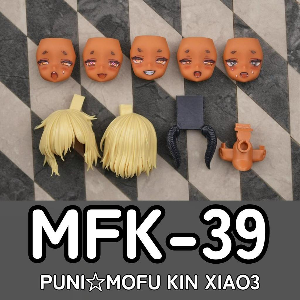 Painted face parts, hair pieces, and connectors for the PUNI☆MOFU KIN XIAO face parts set (Skin E) arranged on a patterned surface.