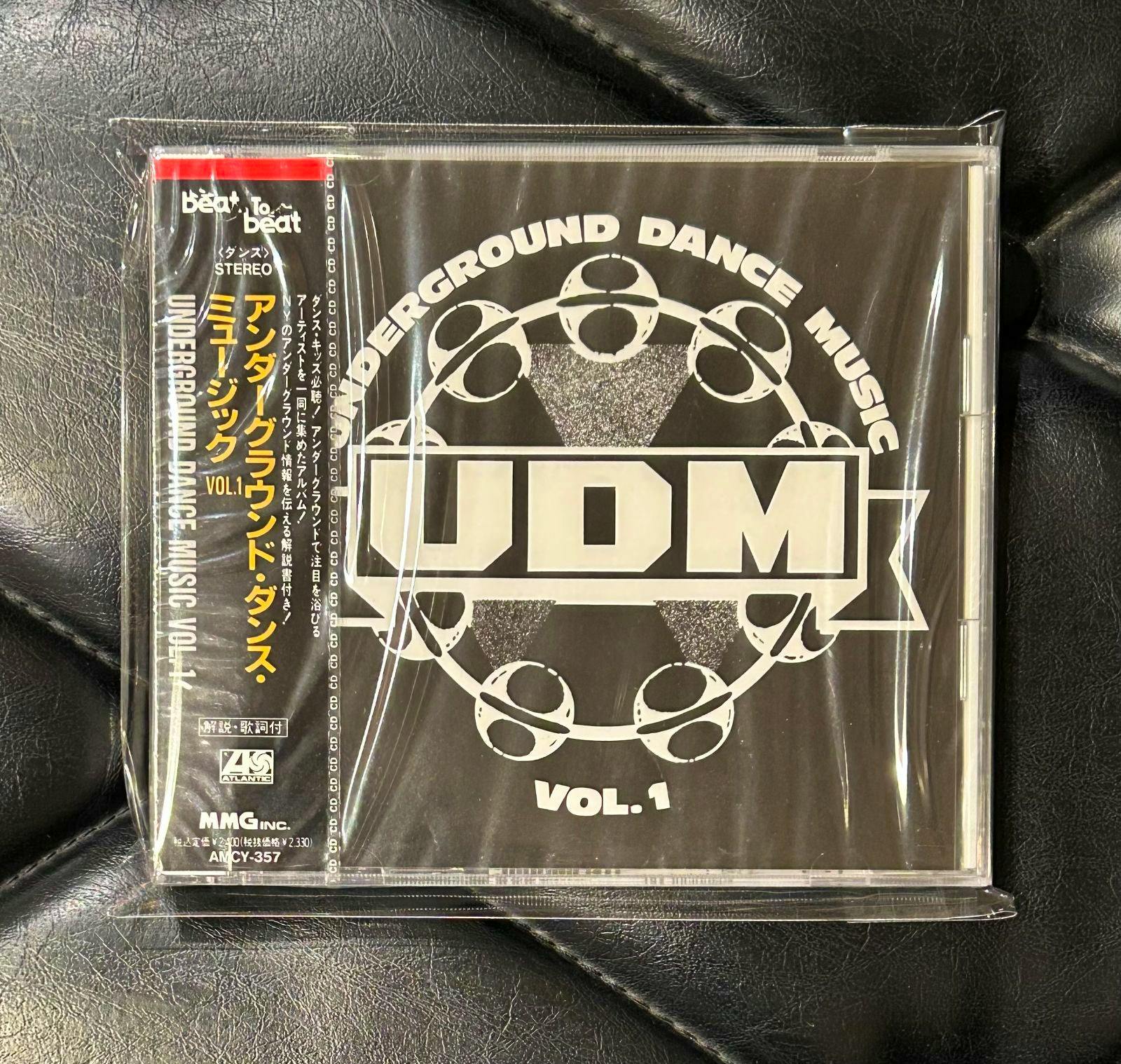 Sealed CD front showing the "Underground Dance Music VOL.1" cover with a Japanese obi strip.