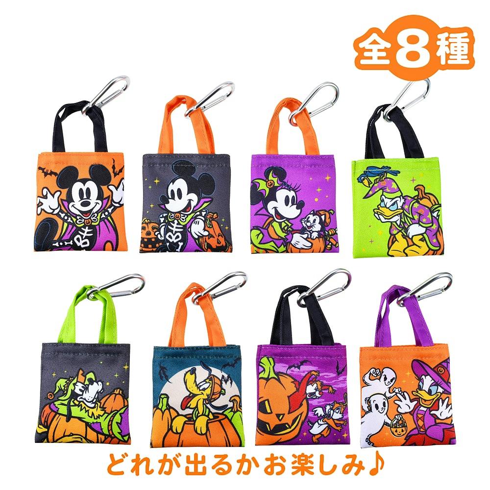 Eight Disney Halloween-themed mini tote bags with carabiners featuring Mickey & friends are arranged on a white background.