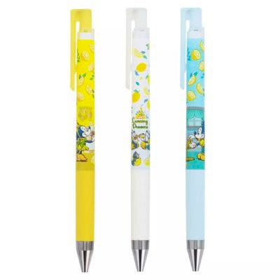 Three ballpoint pens with Mickey and Minnie designs in yellow, white, and light-blue barrels.