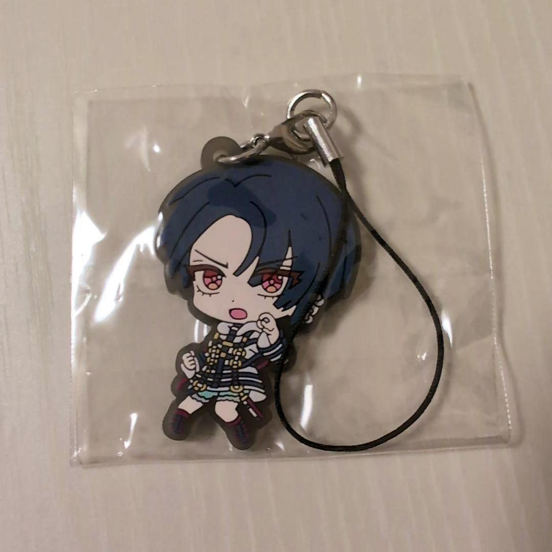 Packaged MILGRAM capsule rubber strap (vol.2) showing the Kotoko chibi character attached to a black cord strap.