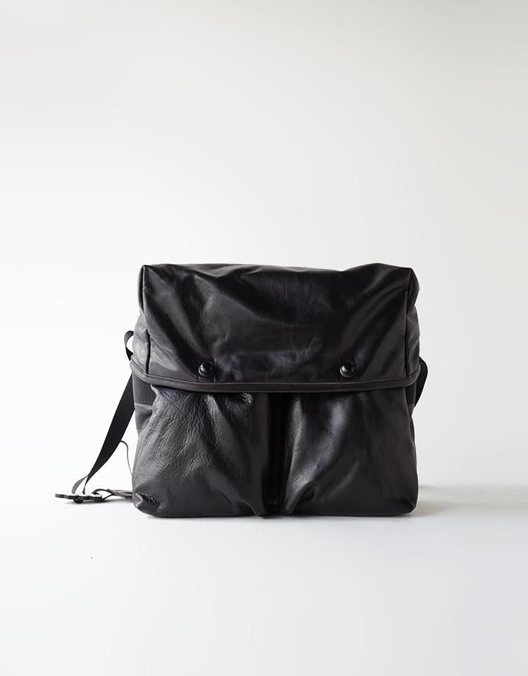 Front view of a black horsehide leather mini messenger bag on a plain white background.