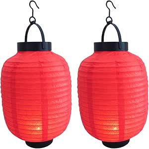 Two red paper lanterns with black tops and hanging hooks shown side by side.