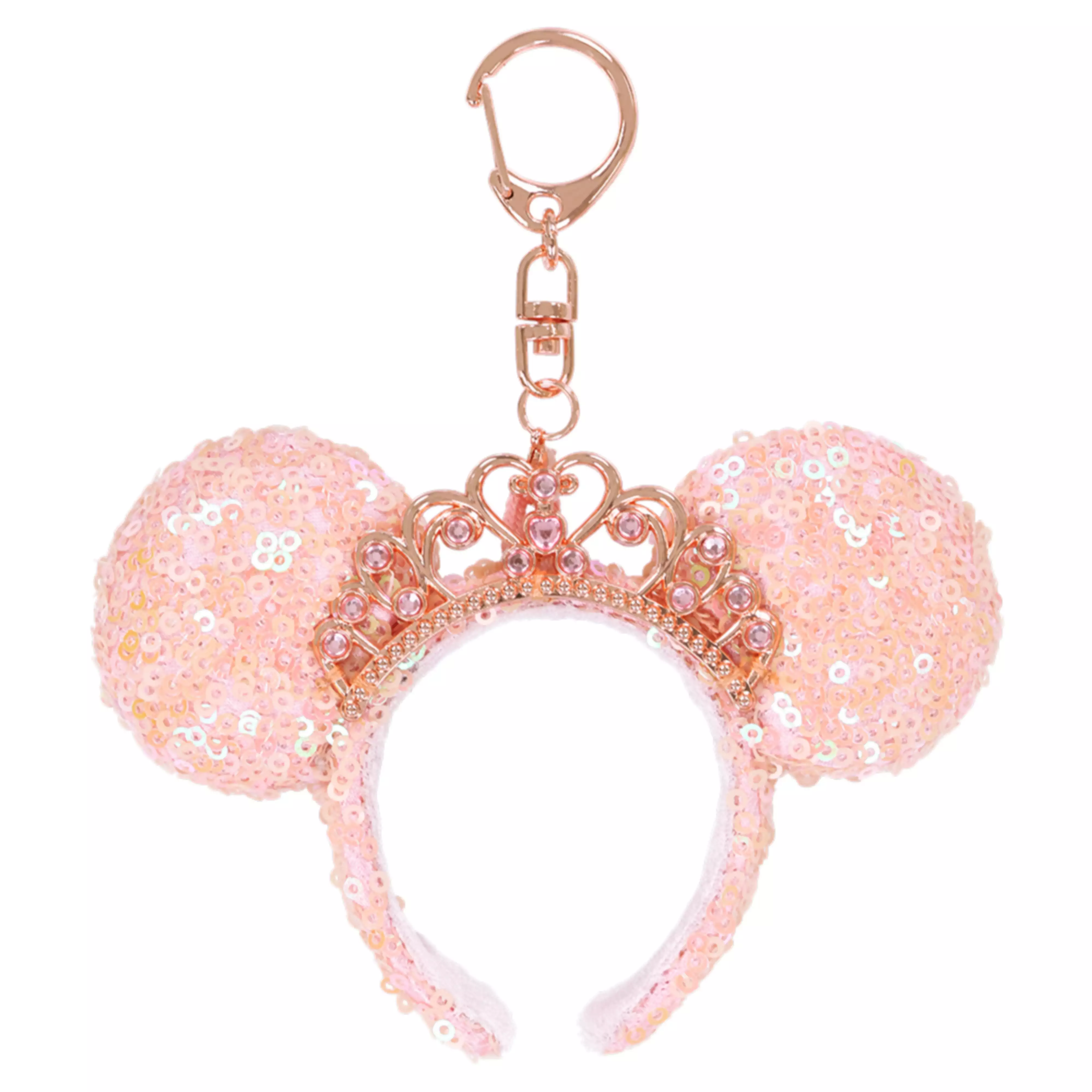 Pink sequin Minnie-ear headband keychain with a small crown and gold-tone clasp.