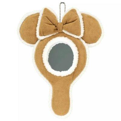 Plush Minnie-shaped keychain hand mirror with a bow, round mirror, and small handle.