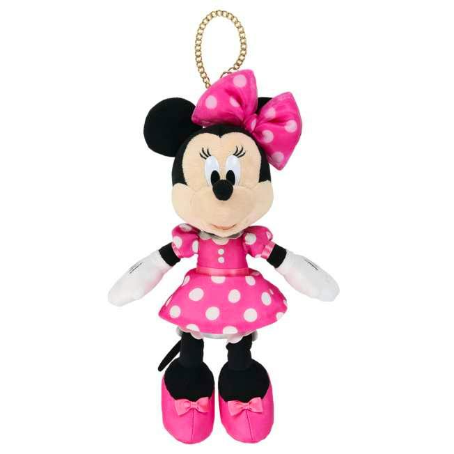 Plush keychain of Minnie wearing a pink polka-dot dress and matching bow with a gold chain attached.