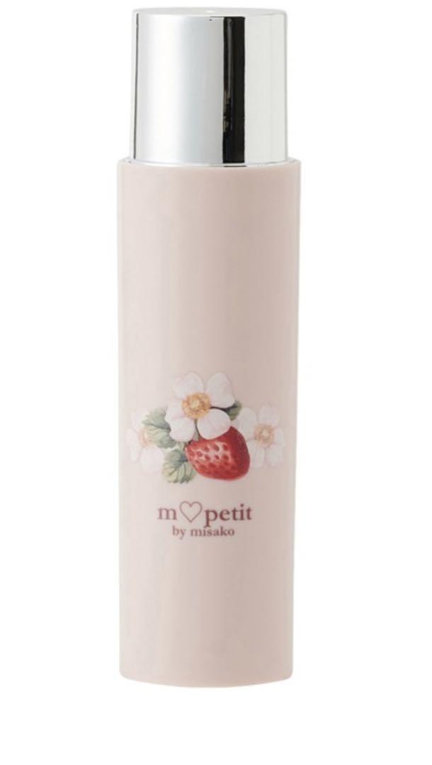 Photo of the pink roll hair brush with a silver top and a strawberry-and-flower illustration on a white background.