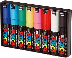 A set of eight Mitsubishi Pencil Uni Posca water-based sign pens with broad chisel tips in assorted colors arranged in a black tray.