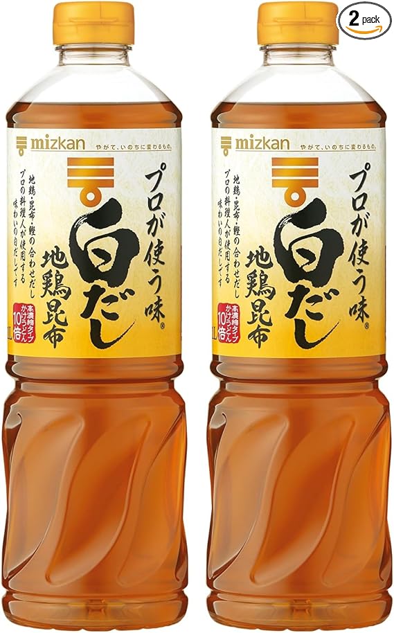 Two 1L bottles of Mizkan Shiro Dashi (white dashi) soup broth with yellow-and-white labels.