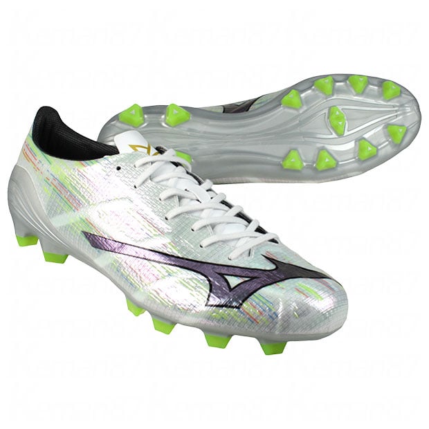 A Mizuno Alpha 2 PRO white×silver iridescent synthetic leather soccer shoe with neon green studs, shown with a second sole view behind it.
