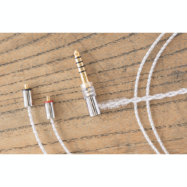 Braided silver-coated MMCX cable with two MMCX connectors and a right-angle 4.4mm plug on a wooden surface.
