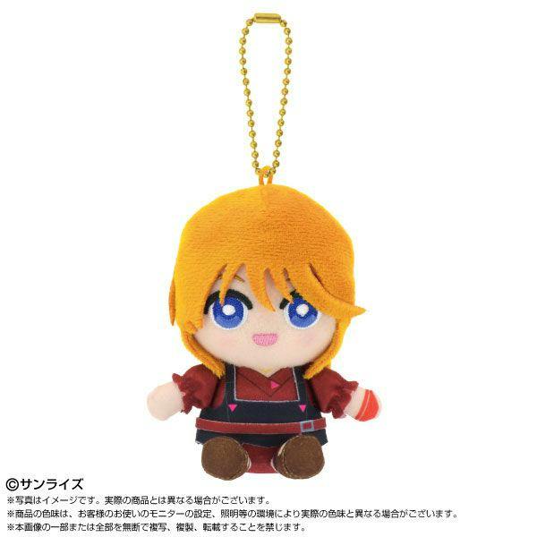 Sitting chibi plush keychain of Elpeo Puru (Gundam ZZ) with orange hair and a gold ball chain on a white background.