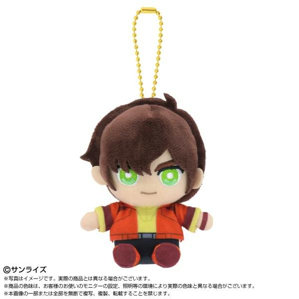 Front view of the Chibi plush sitting mascot keychain of ジュドー・アーシタ (Judau Ashta) wearing an orange jacket with a gold ball-chain attached.