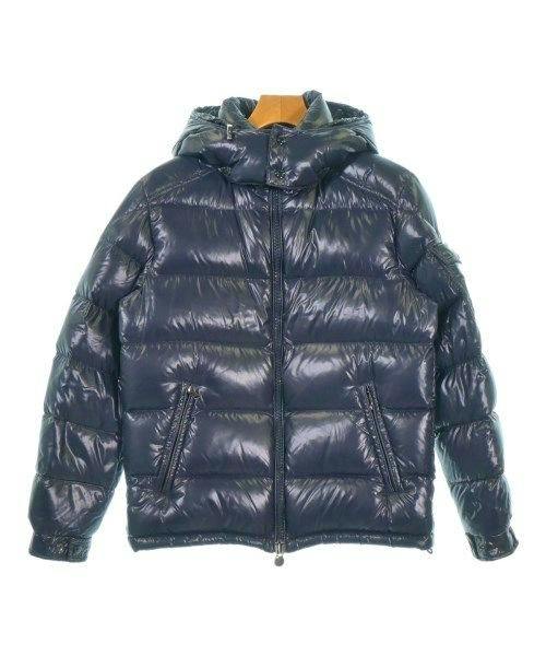Front view of a men's nylon Moncler down jacket with hood hanging on a wooden hanger.