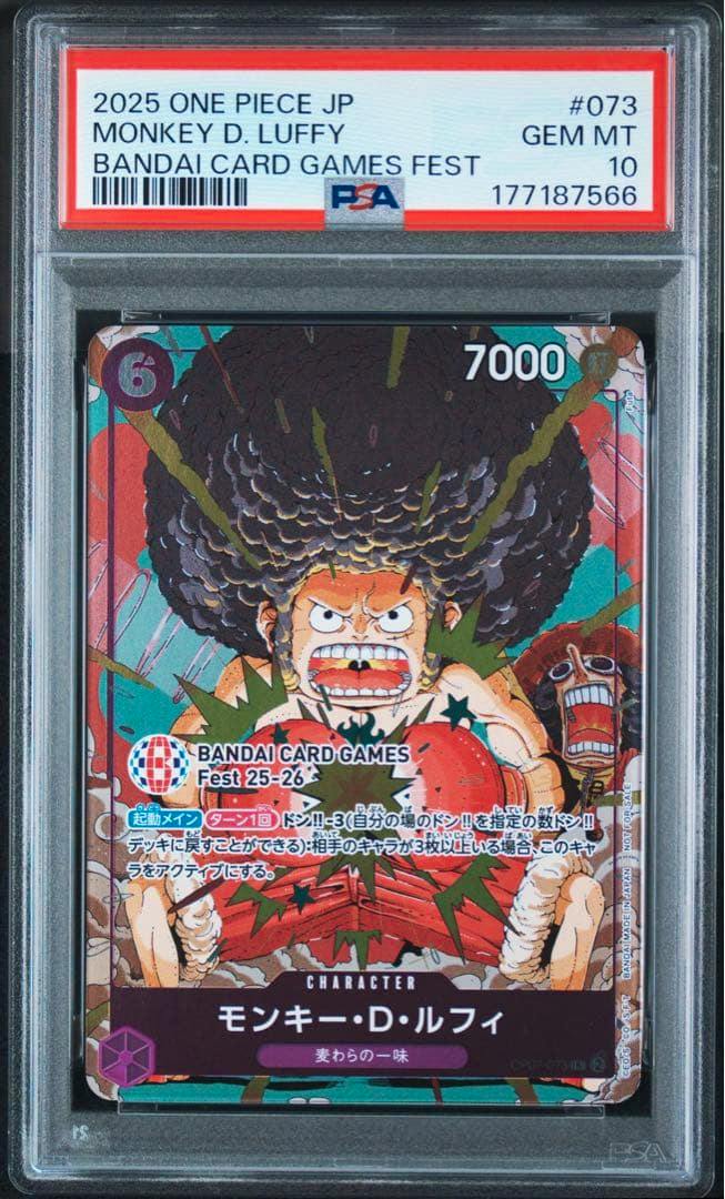 PSA-graded One Piece Monkey D. Luffy trading card front in slab with red PSA label showing GEM MT 10 and "BANDAI CARD GAMES FEST".