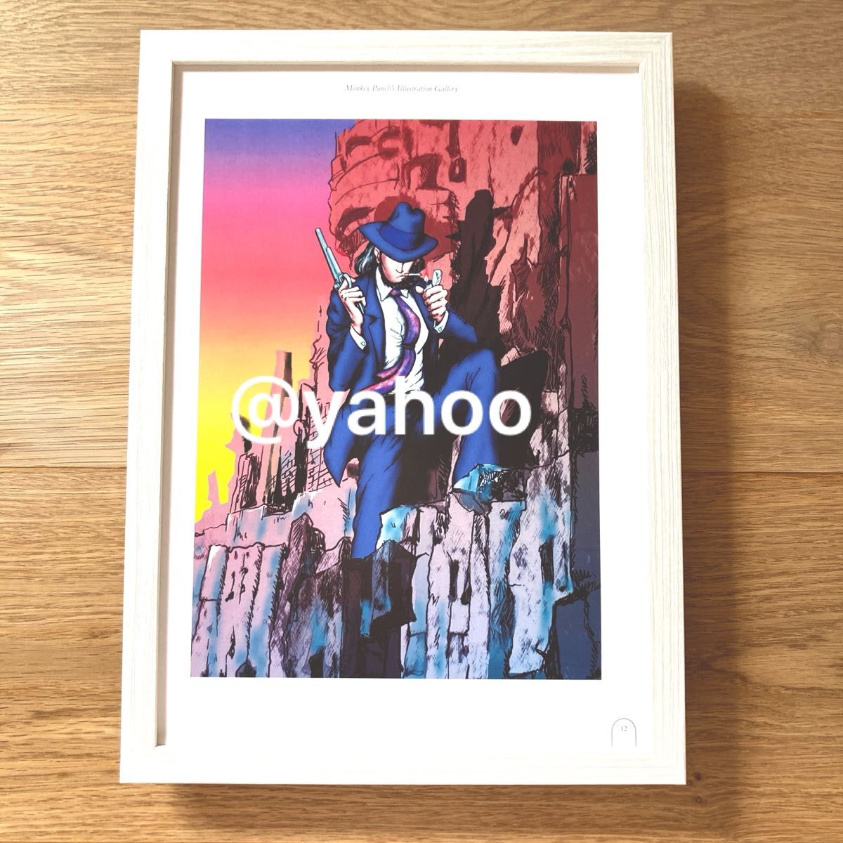 Framed A4 illustration print of Jigen Daisuke (Lupin III) in a light wood frame photographed on a wooden surface with a visible watermark.