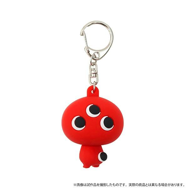Front view of a red Mononoke (Hyakume-chan) rubber keychain showing three eyes and a metal keyring.
