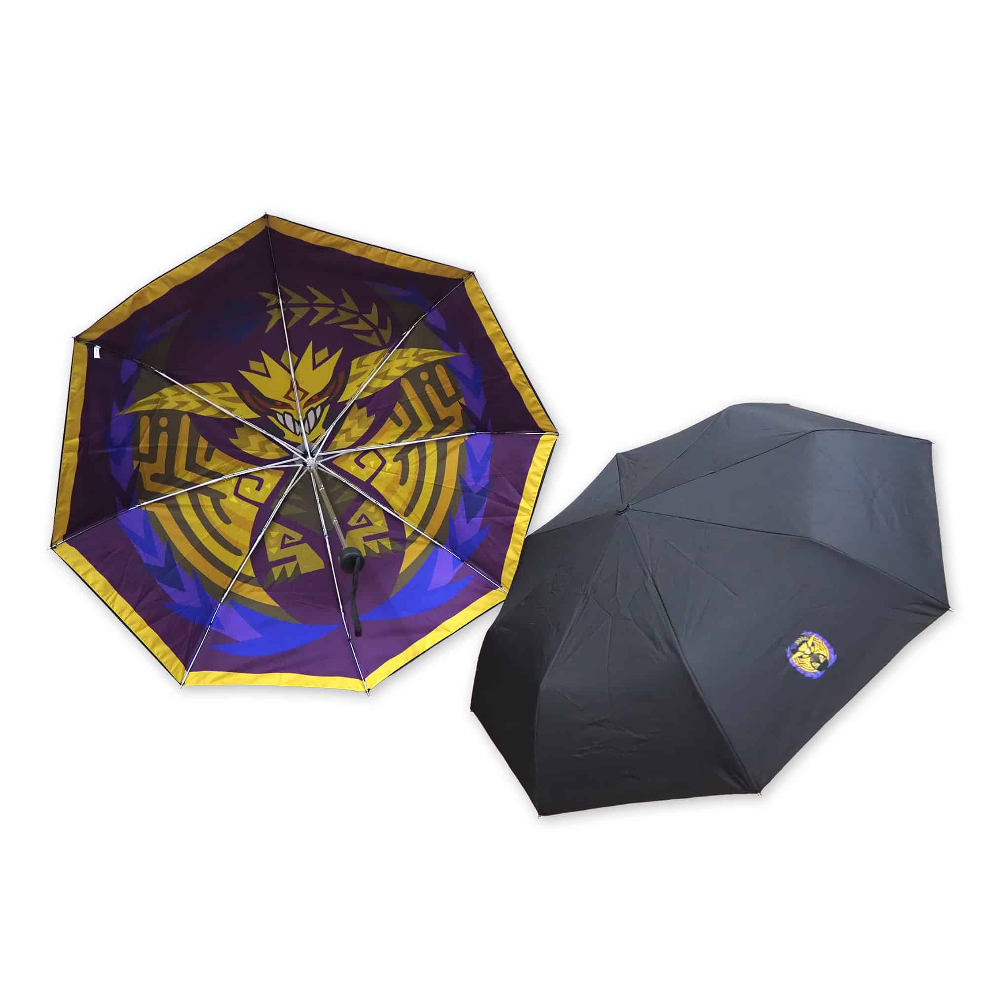 Two umbrellas: one opened showing a purple and gold interior design and one black umbrella with a small emblem on the exterior.