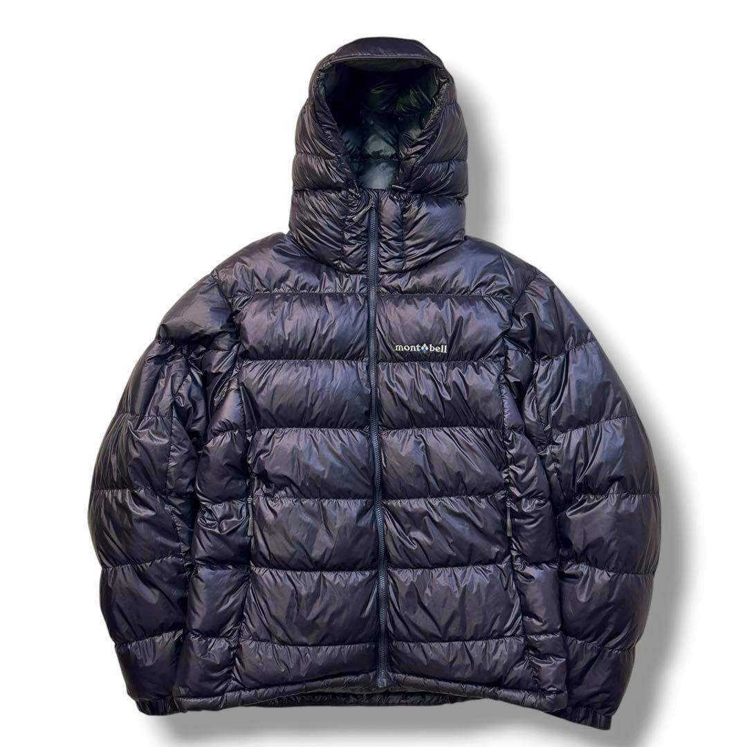 Front view of a men's Montbell Alpine down parka in dark nylon showing the hood, central zipper, and embroidered logo.