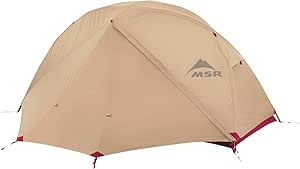 MSR Elixir backpacking tent in beige set up with the tent body and MSR logo visible.