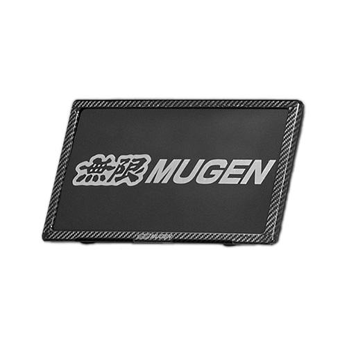 Rear Mugen carbon fiber license plate garnish with a black center panel and MUGEN logo, surrounded by a carbon-fiber patterned border.