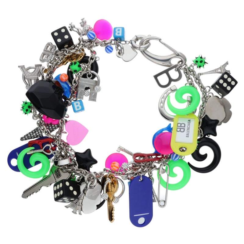 Multi-charm bag charm necklace featuring many colorful plastic and metal charms arranged on a white background.