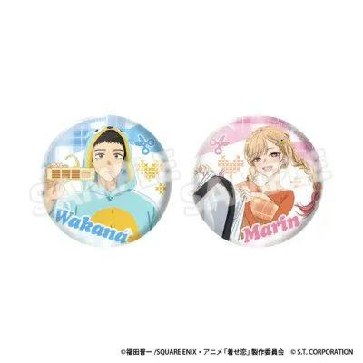 Two round can badges from the pair badge set showing illustrated characters, one labeled “Wakana” and the other “Marin.”